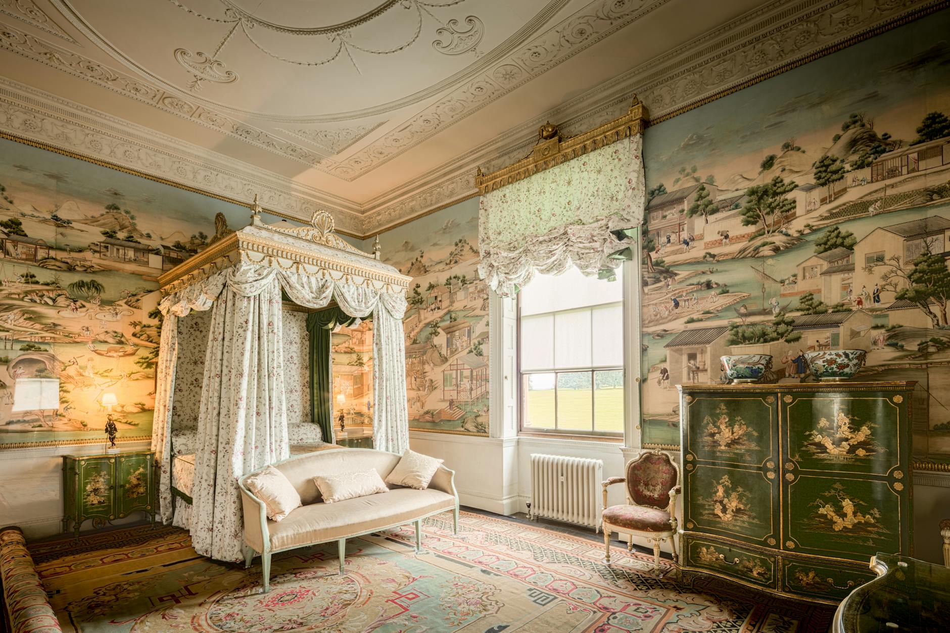 Opulent bedroom at Harewood House featuring ornate decor and elegant furnishings