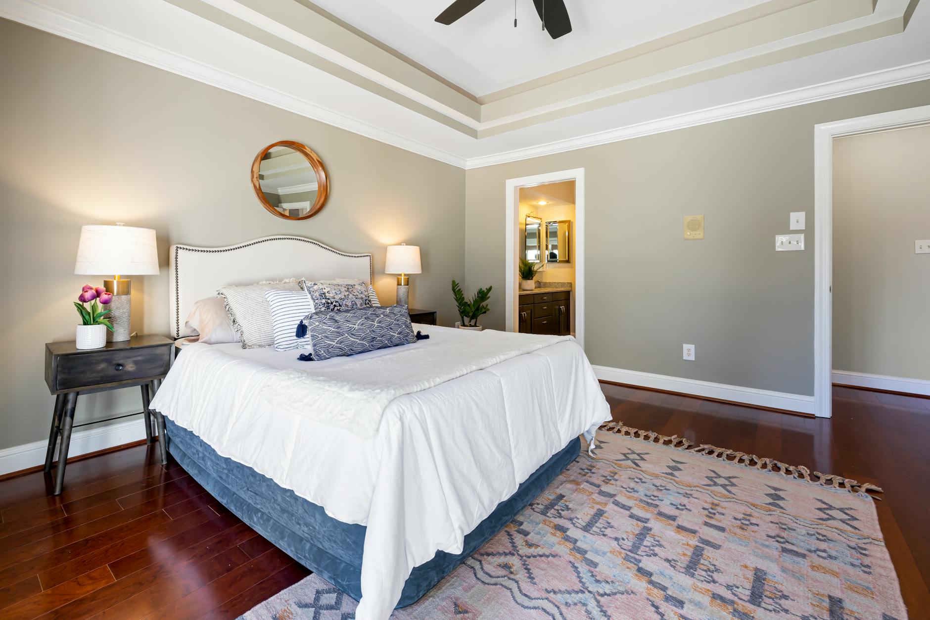 A stylish modern bedroom featuring elegant décor and cozy atmosphere